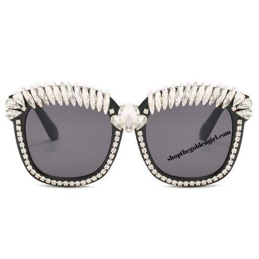 hird Eye Bling Sunnies Black frame with a light weight thick plastic frame with gems all around the eye area.