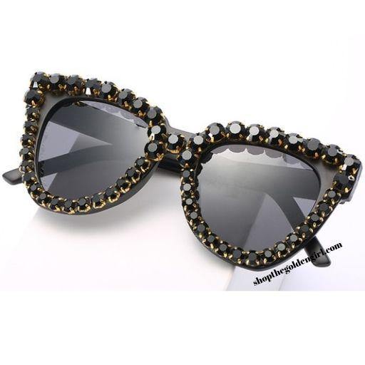 Thick black lightweight frames with gold gems all over eye rims