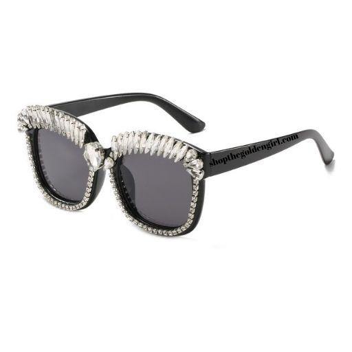 hird Eye Bling Sunnies   Black frame with a light weight thick plastic frame with gems all around the eye area. 