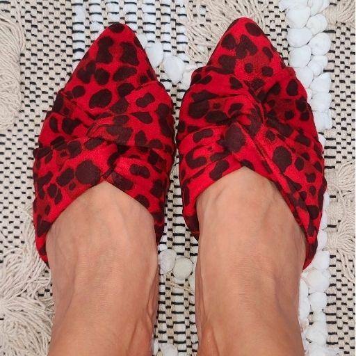 Tie twist detail in front makes these extra pretty, bright red fabric printed leopard mules.